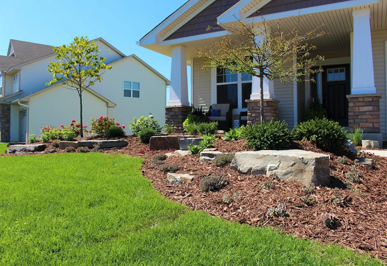 fresh lawn and clean fence line landscaping